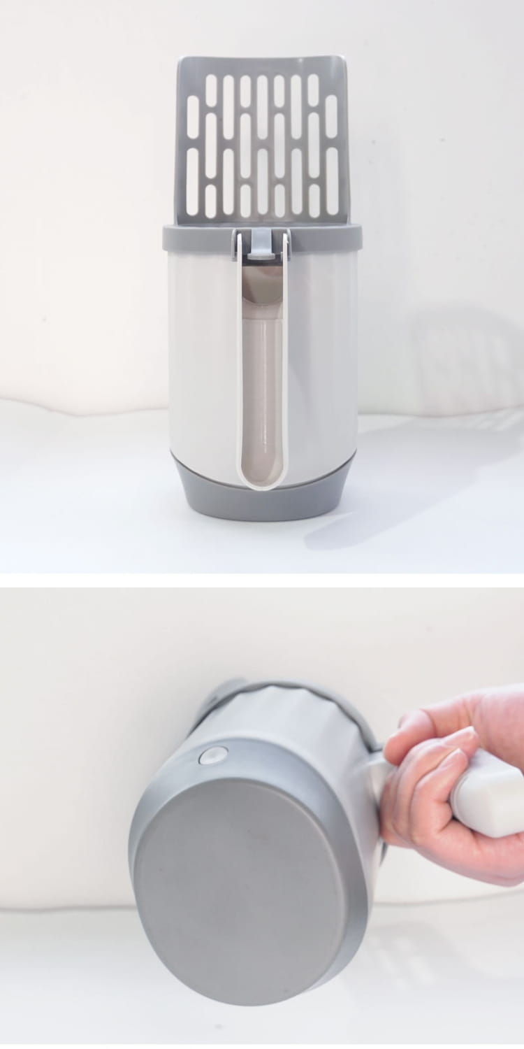 Gray plastic cat litter box with integrated handle and slotted lid featuring an integrated cat litter scoop with trash.