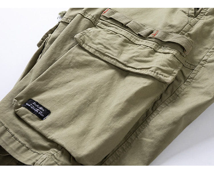 men’s cotton khaki cargo shorts with multiple pockets and a branded label on the side seam in a relaxed fit with drawstring closure.