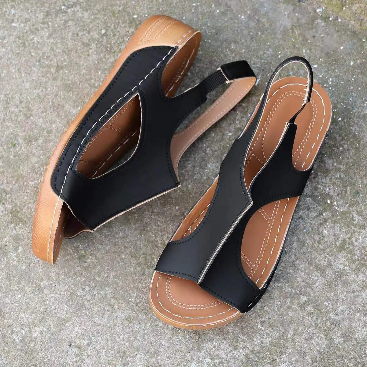 Tan recycled leather wedge sandals for women with elastic straps cutout details and white stitching for summer wear