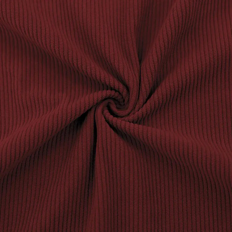 Slim fit corduroy patchwork pullover with contrast accents in rich burgundy corduroy fabric featuring a soft ribbed texture.