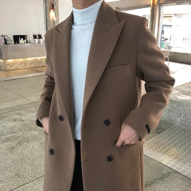 A sleek camel-colored wool overcoat with a double-breasted design and dark buttons for men winter jacket.