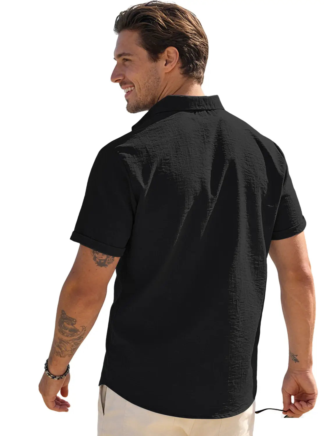 Men’s black short-sleeved button-up shirt made from textured bamboo linen fabric.