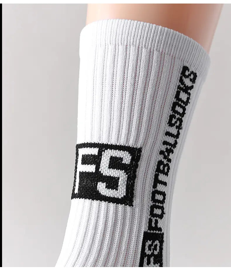 White ribbed athletic football grip sock for men featuring an anti-slip design with a black fs logo and vertical f.s football socks text.