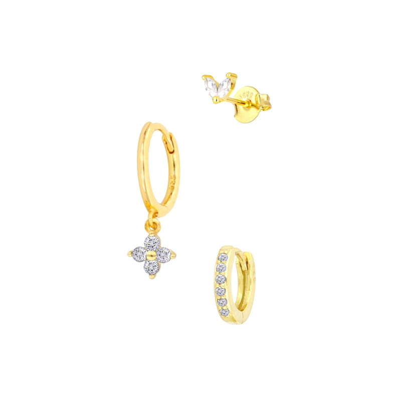 Gold-toned floral and butterfly hoop earrings set featuring delicate crystal accents with a four-petal flower dangling design and another hoop adorned with a row of tiny stones.