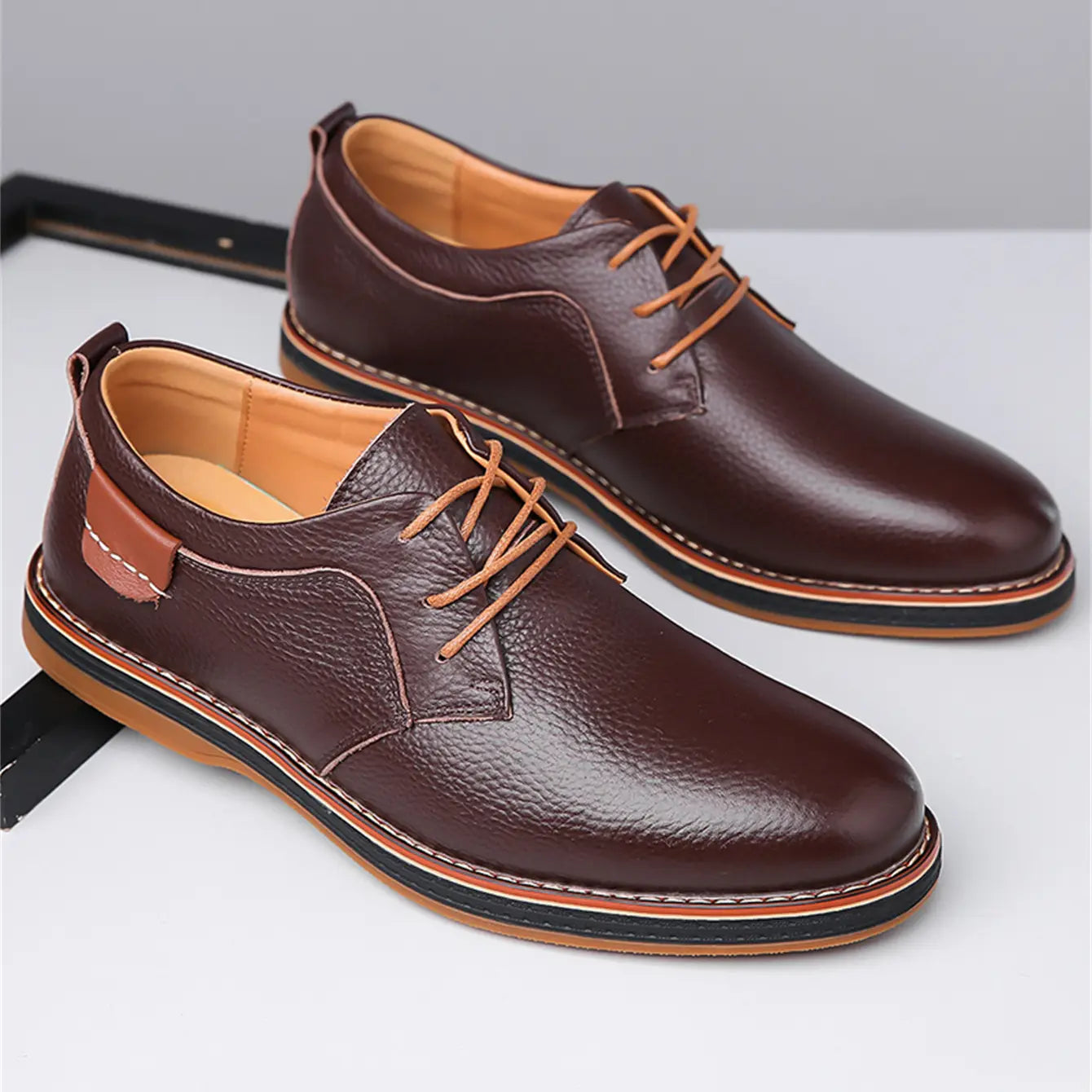 men’s handmade genuine leather lace up oxford shoes in brown leather with tan laces and a black and tan contrasting sole