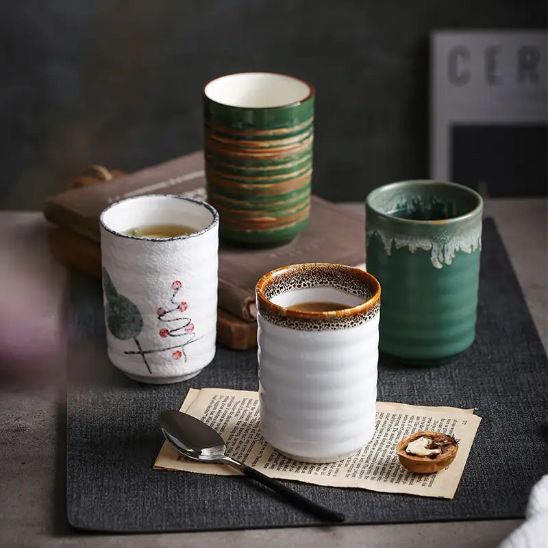 White ceramic mug with textured surface and brown speckled rim for tea drinking in a Japanese ceramic mug retro hand-painted tea cup 250ml design.