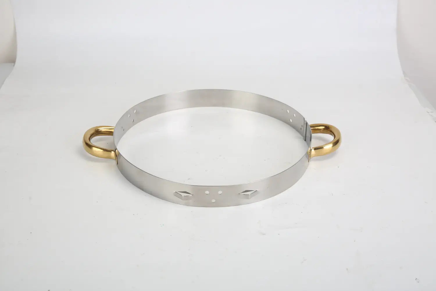 Silver metal ring with gold-colored handles and diamond-shaped cutouts on a 4pcs round chafing dish buffet set 4.76qt stainless steel container.