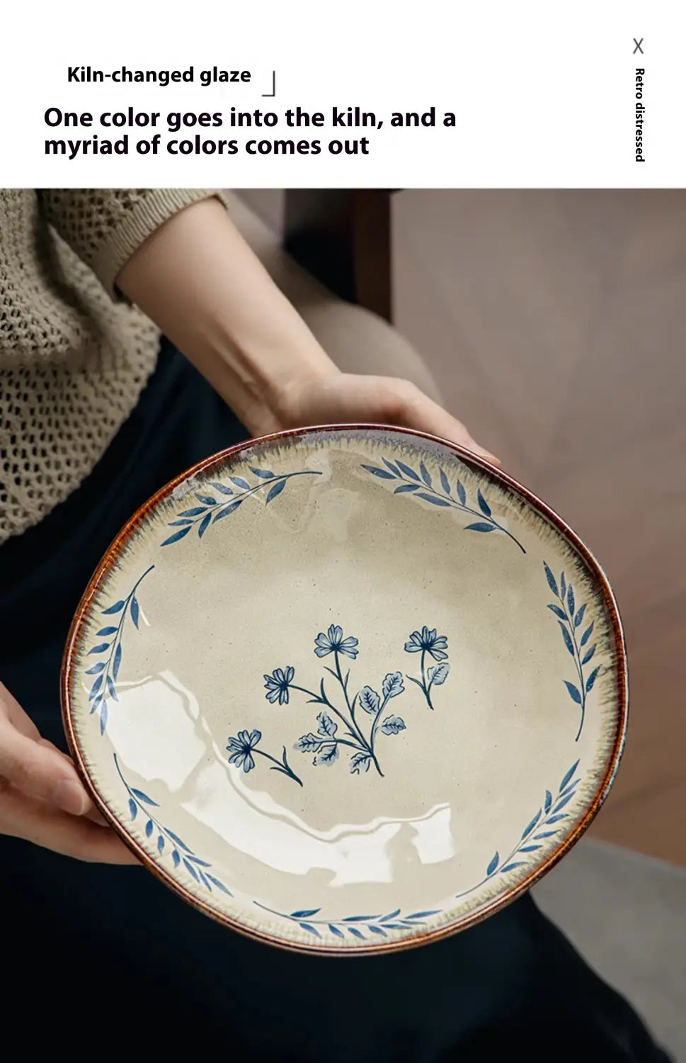 Cream-colored 9-inch ceramic deep plate with delicate blue floral and leaf patterns and a rustic brown rim.