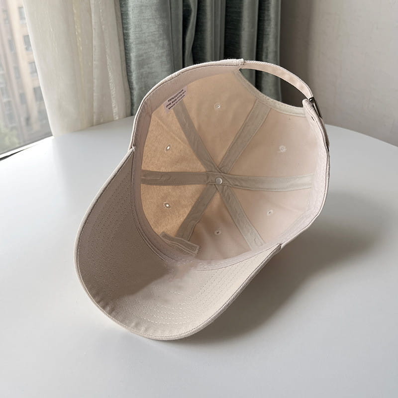 Beige large fit cotton baseball cap for men with a structured crown and curved brim.