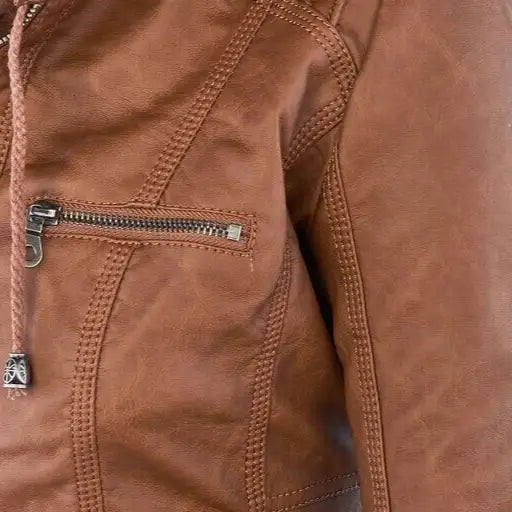 Brown faux leather moto jacket with front zipper pocket decorative stitching and detachable hood.