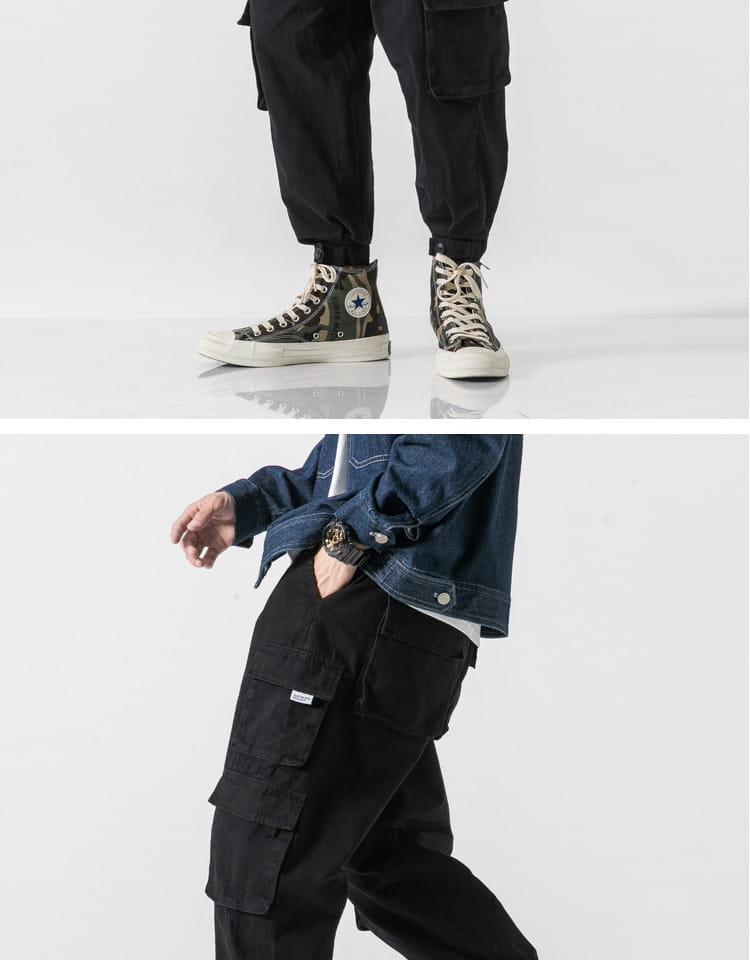 Pantalones cargo militares japoneses casuales negros de tiro cónico, con múltiples bolsillos y un ajuste relajado.