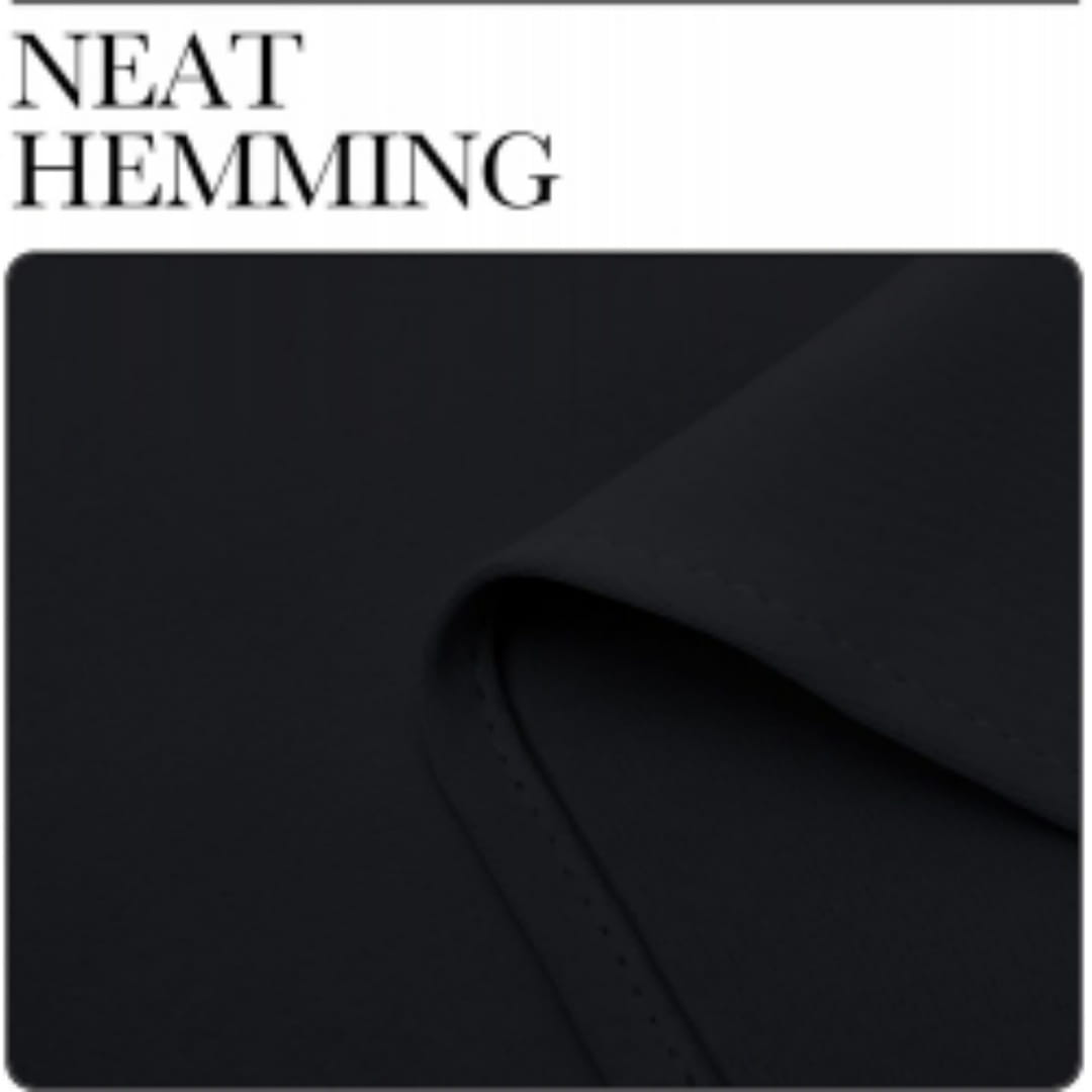 Black blackout curtains three layer grommet pair showing neat precise hemming on black fabric edge.