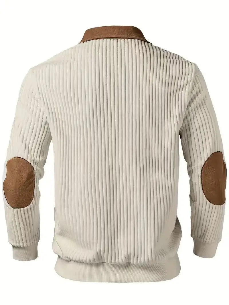 Men’s ribbed half zip knit sweater in cream-colored corduroy with brown leather elbow and collar patches.