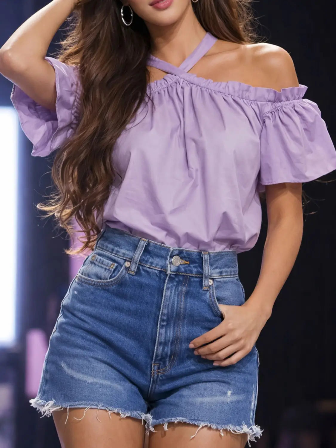 Lavender off-the-shoulder ruffle blouse featuring a halter neckline and ruffled sleeves made from lightweight fabric ideal for casual and semi-formal occasions.