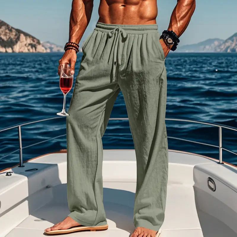 Men’s olive green linen joggers featuring a casual drawstring waist for comfortable everyday wear.