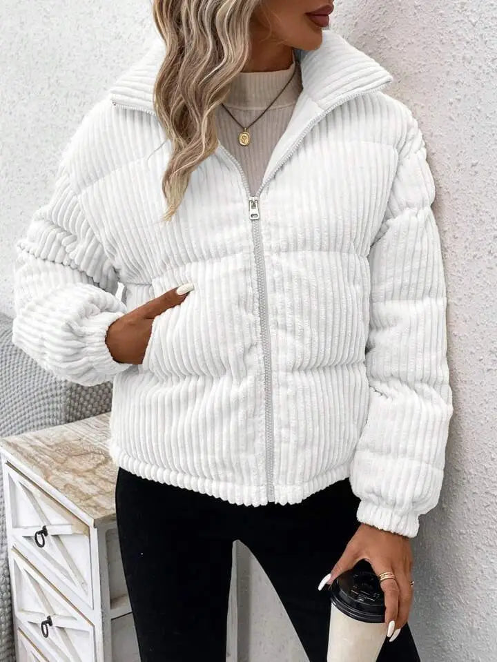 white corduroy puffer jacket with a high collar and front zipper designed as a plus size women winter coat.
