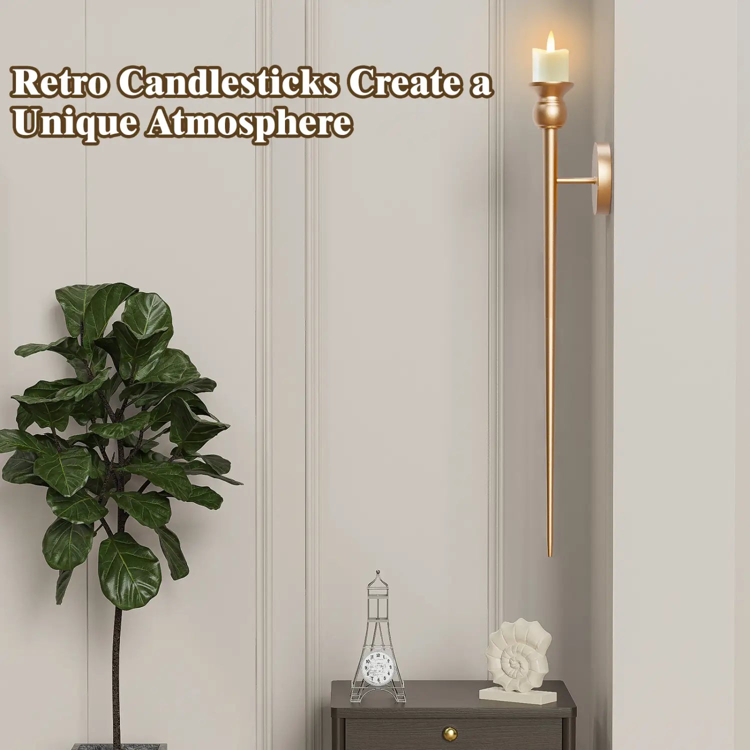 Gold-toned retro candlestick sconce with a slender elongated design featuring a lit white battery operated candle 33 inch wall sconce.
