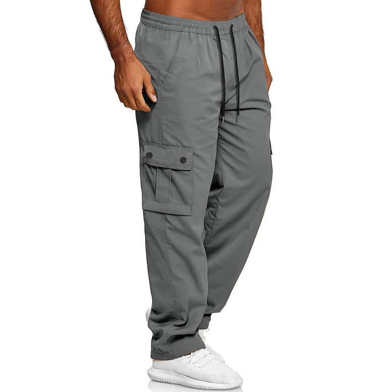 Mens straight leg cargo work pants in gray with black drawstrings and buttoned flap pockets for durable utility.