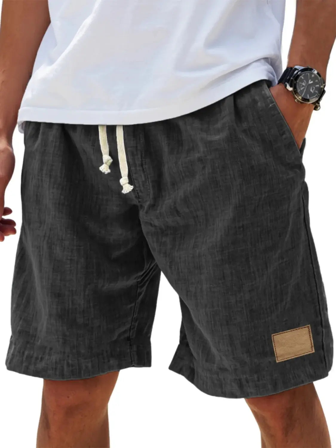 men linen holiday shorts in dark gray corduroy with cream-colored drawstrings and a tan leather patch featuring a retro breathable loose fit design.