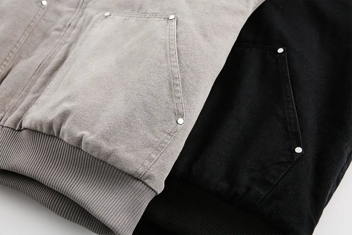 Chaqueta vaquera gris y negra con puños acanalados, presentada como abrigo acolchado de invierno de algodón con forro de piel sintética para hombre y mujer