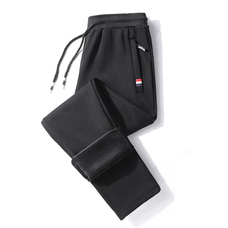 black fleece lined cotton joggers for men with elastic waistband drawstring and a red white and black striped patch on the side pocket