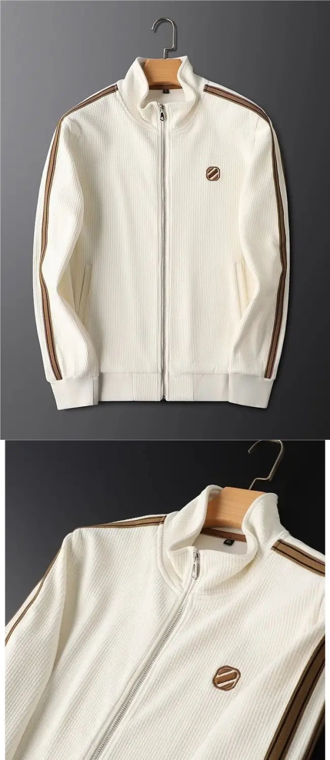 cream-colored ribbed corduroy men track jacket with brown striped side panels and a small circular logo on the chest part of a striped tracksuit set