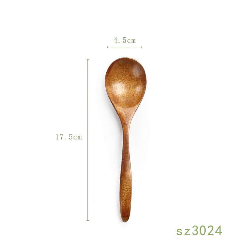 Japanese wooden honey spoon handcrafted from smooth light brown hemu wood with a gently curved bowl and slender handle.
