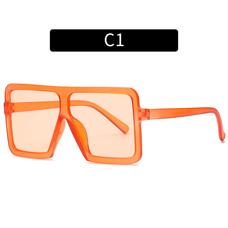 Oversized square translucent orange uv400 fashion sunglasses with a bold modern design and square frame.