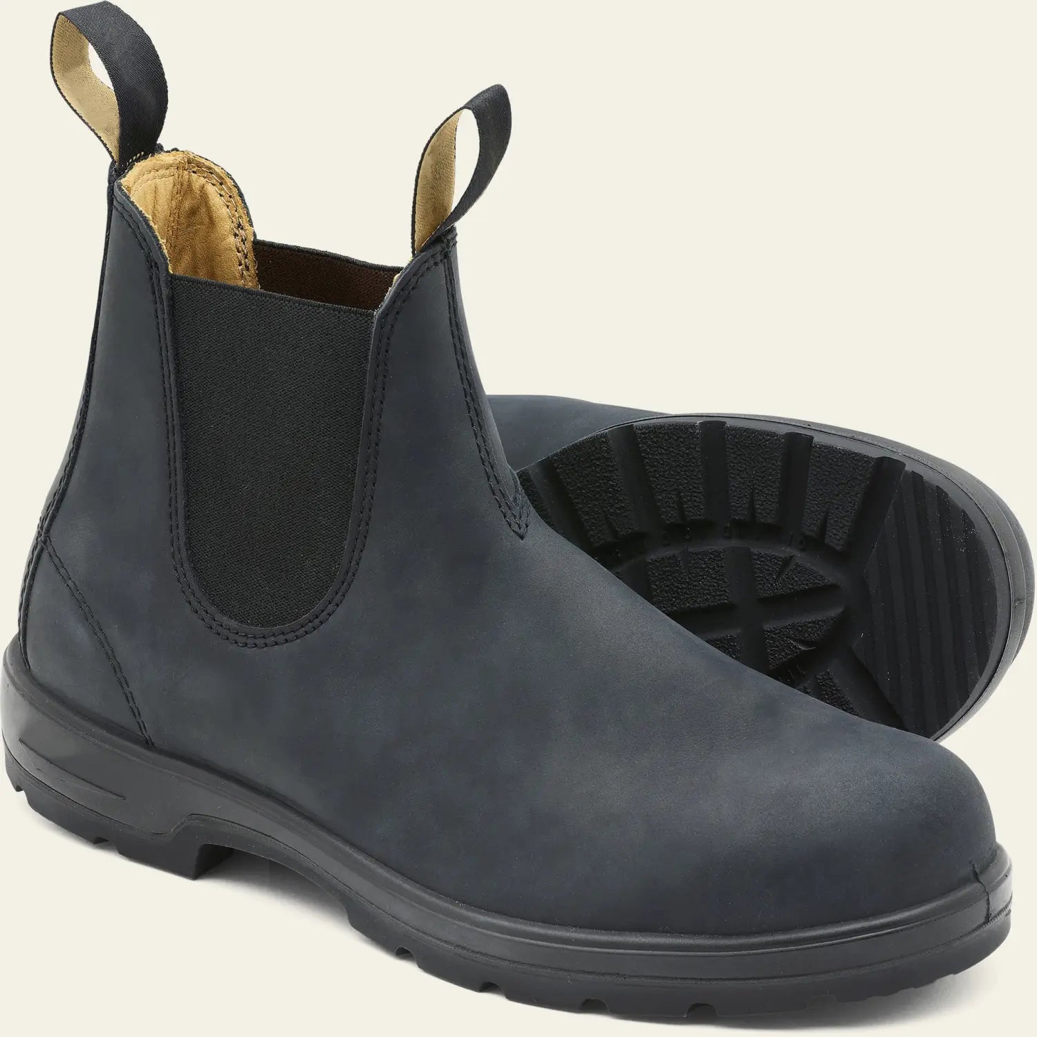 dark blue suede chelsea boot with black rubber sole and pull tabs from the unisex vintage leather martin boots collection.