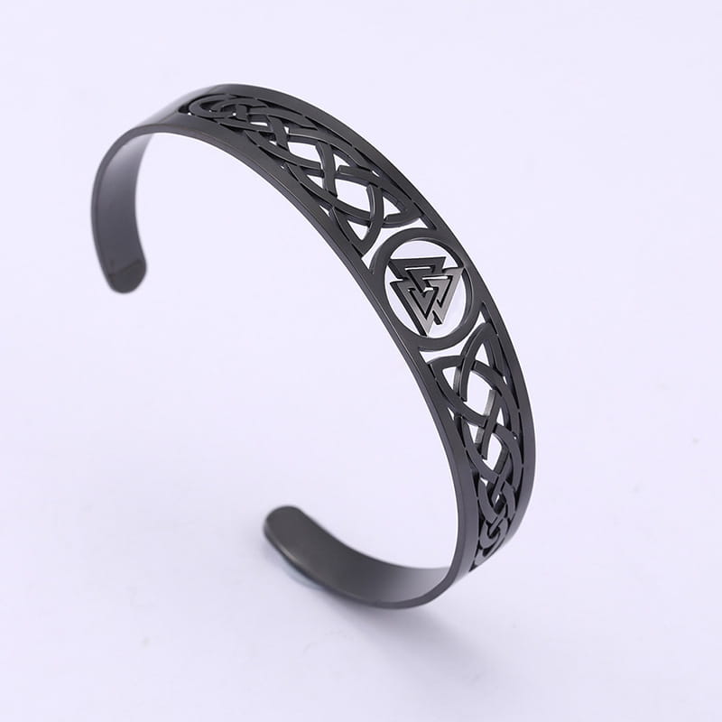 Black metal stainless steel cuff bracelet featuring intricate Celtic knotwork and a central Valknut triangular symbol.