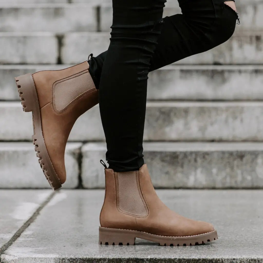 brown suede chelsea boots with chunky platform sole featuring tan suede material and a textured rubber sole