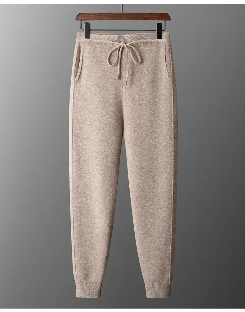 Beige knit men’s wool harem pants high waist casual joggers with a drawstring waist and ribbed cuffs.