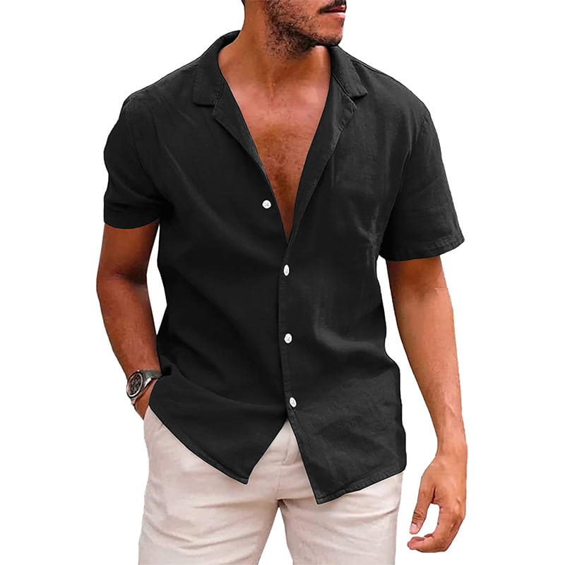 Men’s casual textured short sleeve button down shirt in black featuring a collar and white buttons.
