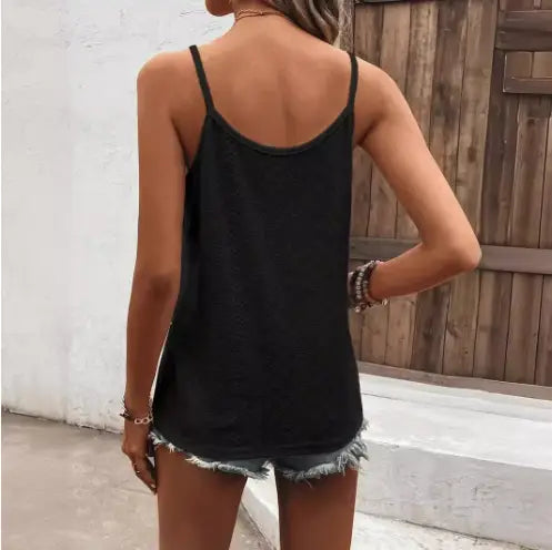 black spaghetti strap tank top with a relaxed fit and frayed hem displayed as part of a white lace knit camisole vest set