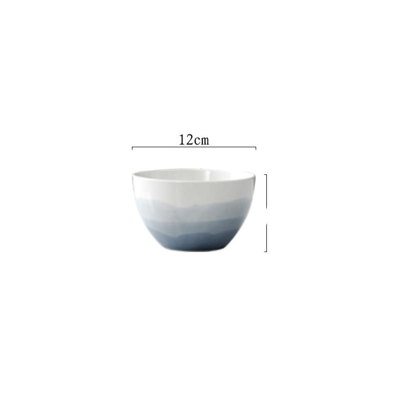 A 12cm wide ceramic bowl from the ceramic gradient blue steak plate and bowl set with a smooth gradient finish transitioning from white at the rim to deep blue at the base.
