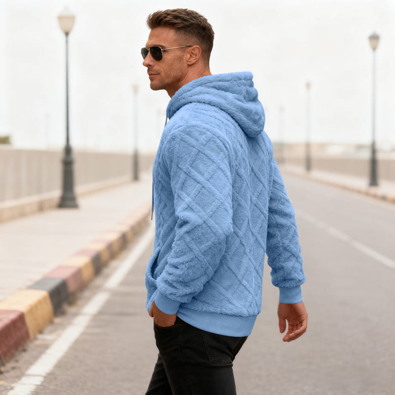 Light blue quilted fleece hoodie for men featuring a textured fleece lined knit design.