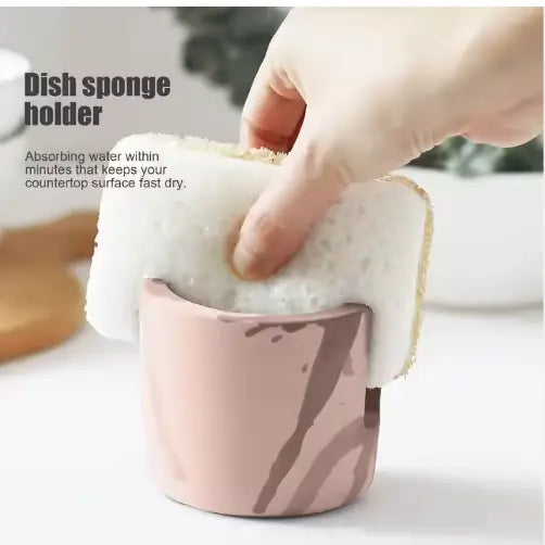 pink marble-patterned diatom mud ceramic sponge rack holder designed for sink organization and dish sponge storage
