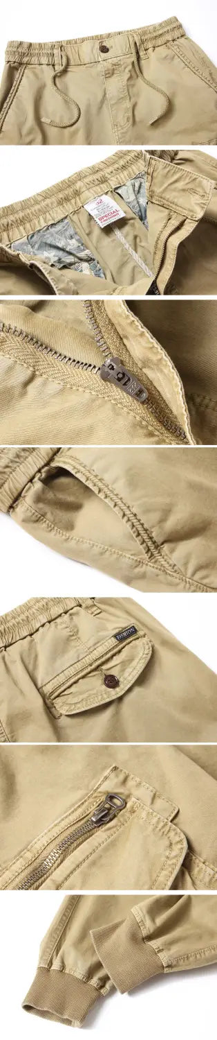 Men’s slim fit khaki cotton cargo work pants with multiple pockets, zipper closures, and elastic waistband.