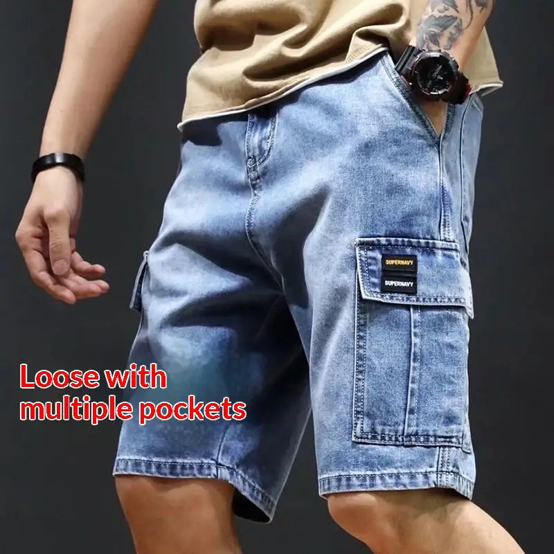 light-wash denim cargo shorts with multiple pockets and a supernavy brand patch on the thigh pocket designed for youth workwear.