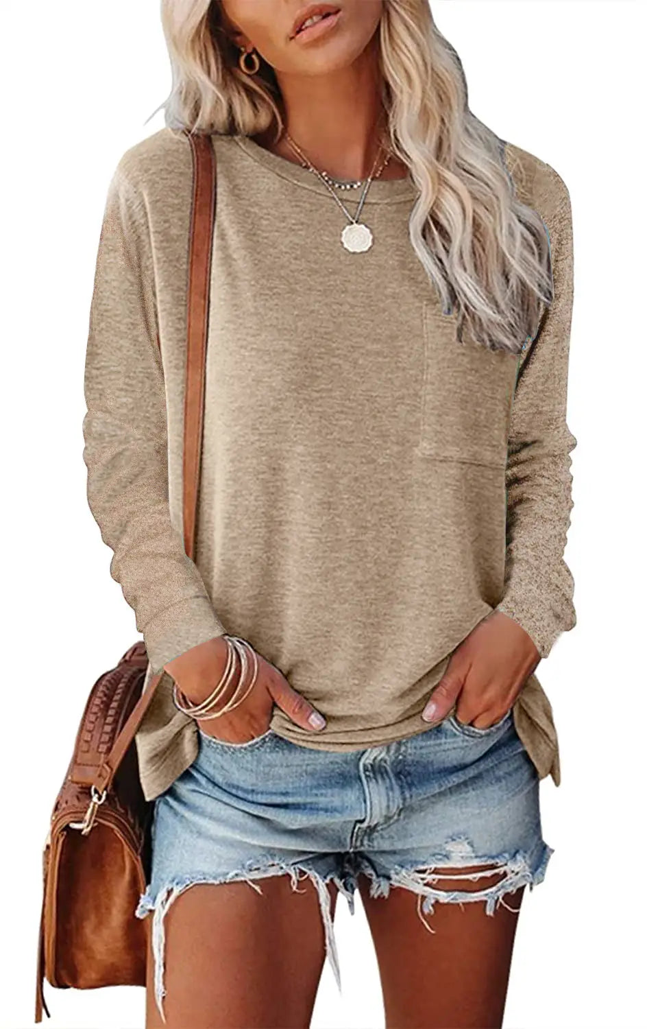 Beige relaxed pocket knit long sleeve t shirt with a relaxed fit and front pocket.