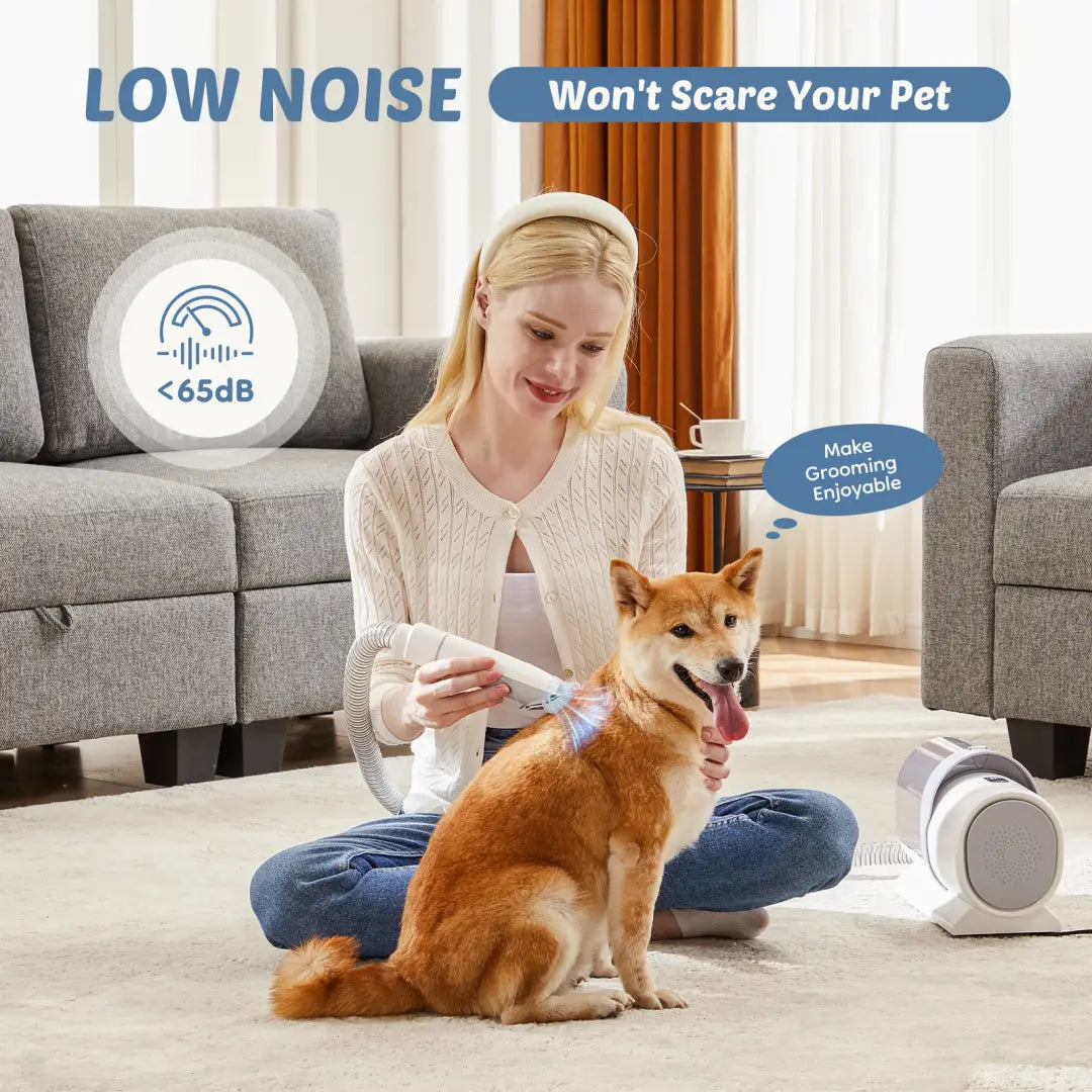 White electric pet grooming vacuum clipper with a flexible hose and ergonomic handle designed for low noise operation under 65db from the pet grooming vacuum clippers 2.5l kit.