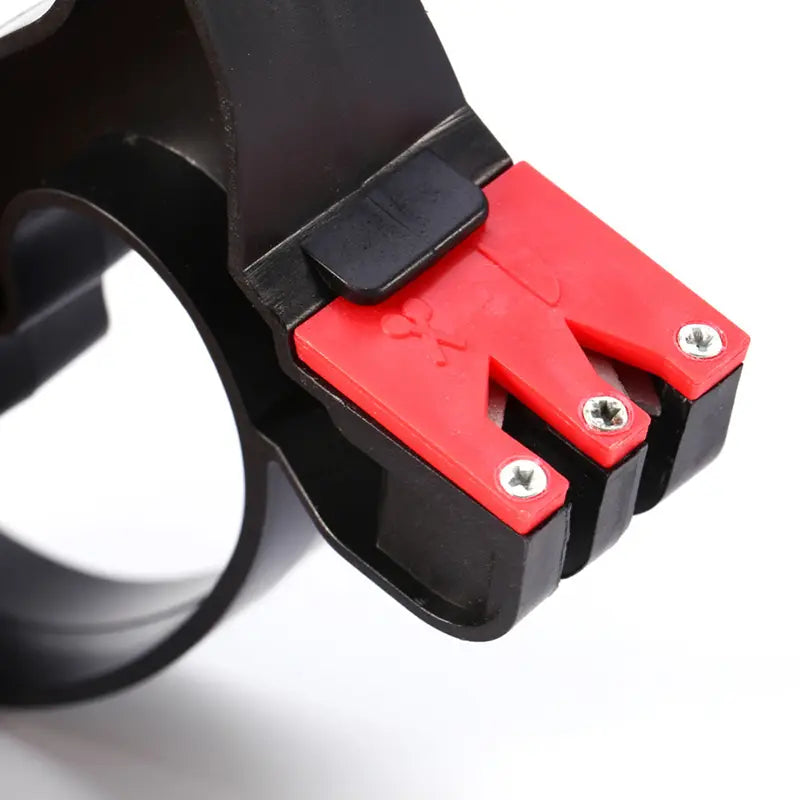 Black and red plastic knife sharpener with a sleek ergonomic design for knife and scissor sharpening in the kitchen.