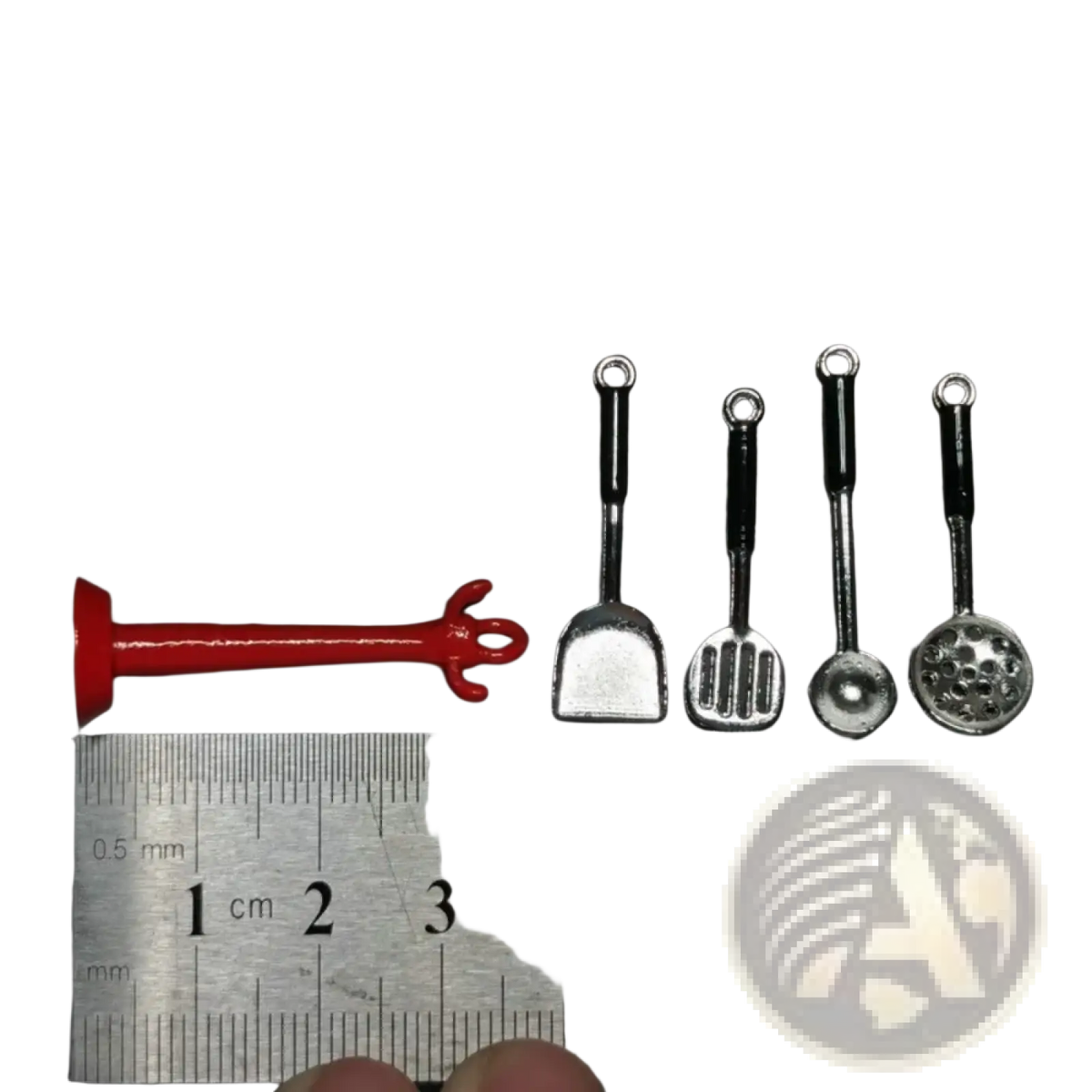 Red plastic fork-like kitchen tool from 1:12 miniature metal kitchen utensil set for dollhouse cooking play