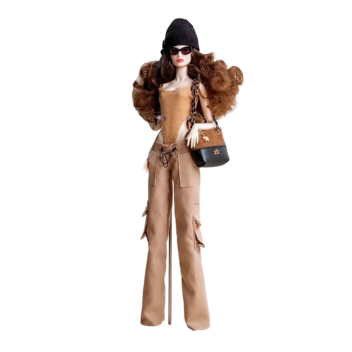 A fashion doll with long brown curly hair wearing sunglasses and a black beanie in a 1/6 doll fall winter retro jacket set