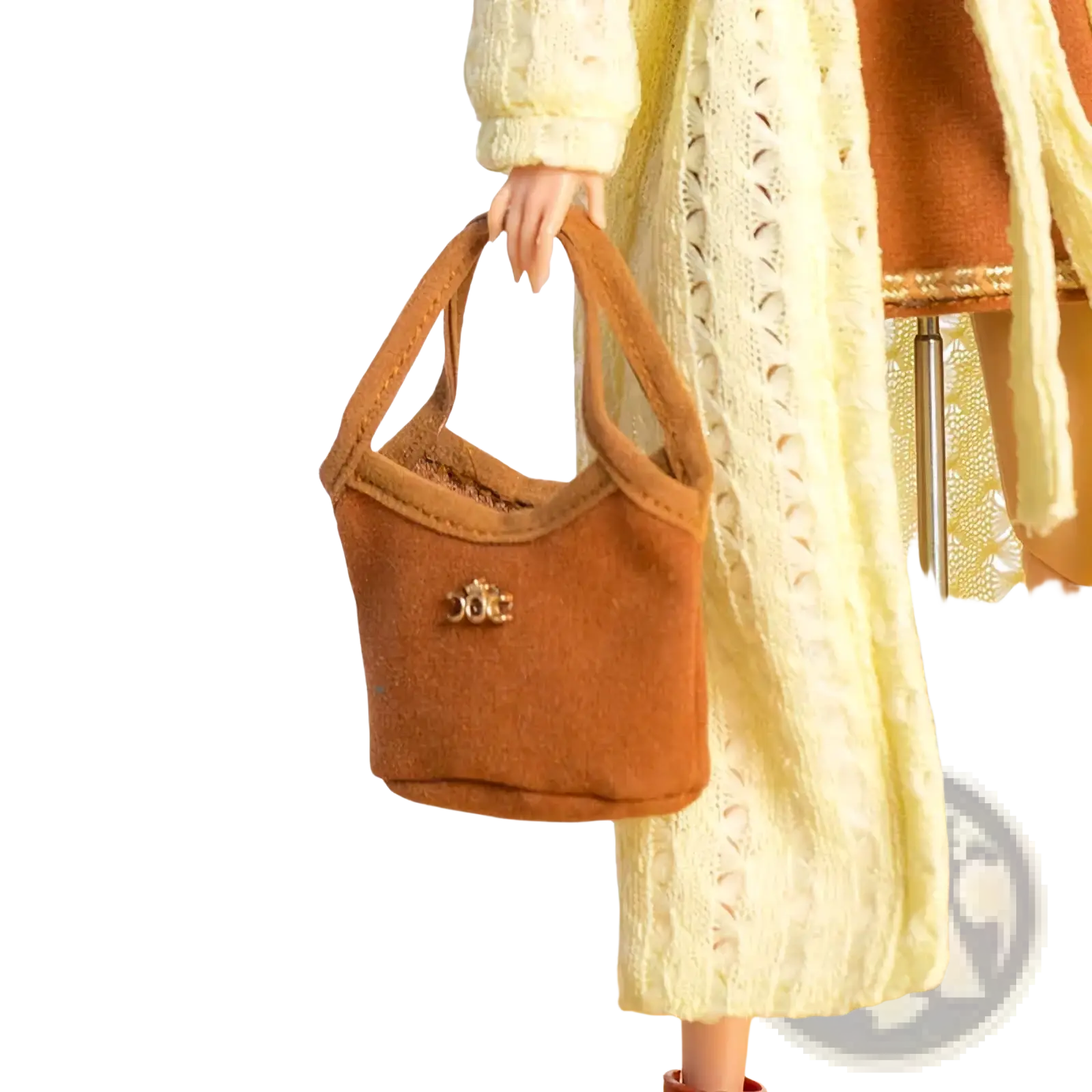 A tan suede miniature handbag with a gold-toned clasp for 1/6 doll handbag and hat fashion accessories