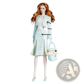 A 1/6 scale doll wearing an elegant light mint green textured two-piece outfit with matching handbag