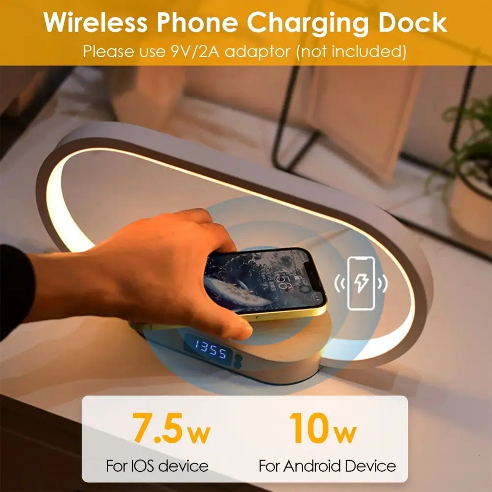 Modern white wireless charging dock with sleek curved design and integrated led lighting for oval touch lamp with clock