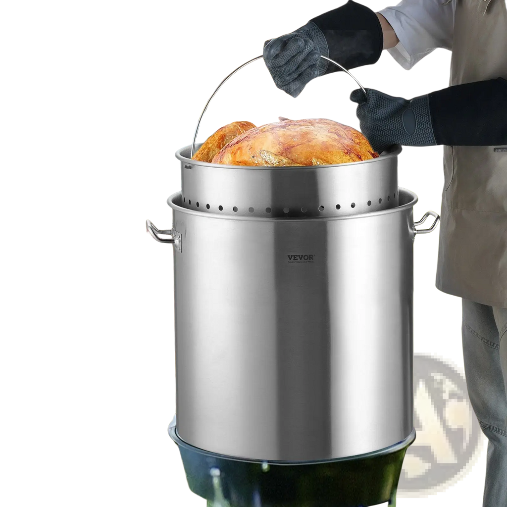 Stainless steel 100qt stockpot with perforated strainer basket and handle designed for outdoor turkey roasting