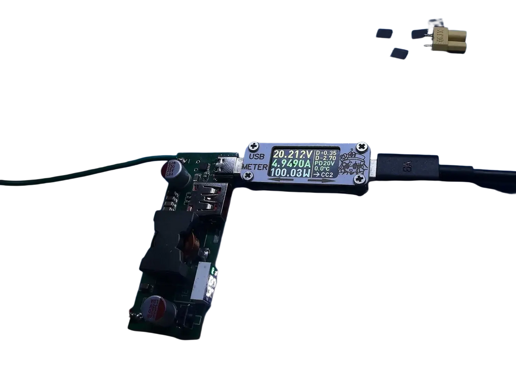 Black usb power meter with green digital display showing voltage and current for 100w pd3.1 fast charger power bank module bms