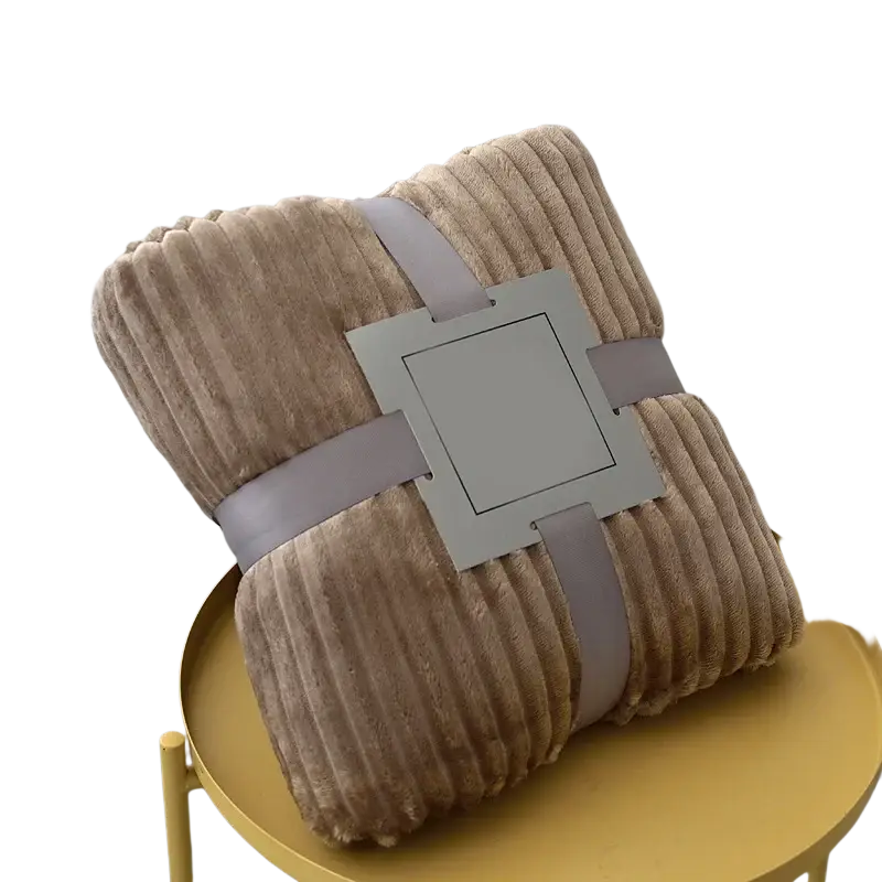 Beige 100x150cm fleece throw blanket with plush corduroy texture and gray ribbon ties for bed or sofa use
